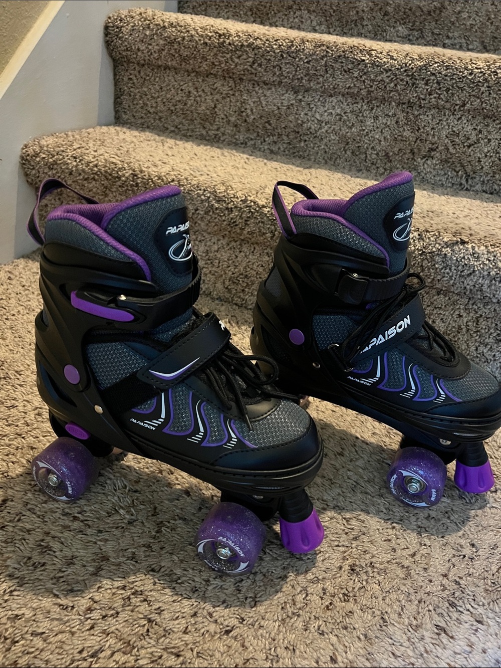 Raiders Adjustable Kids Quad Roller Skates - Black and Purple- wheels light up